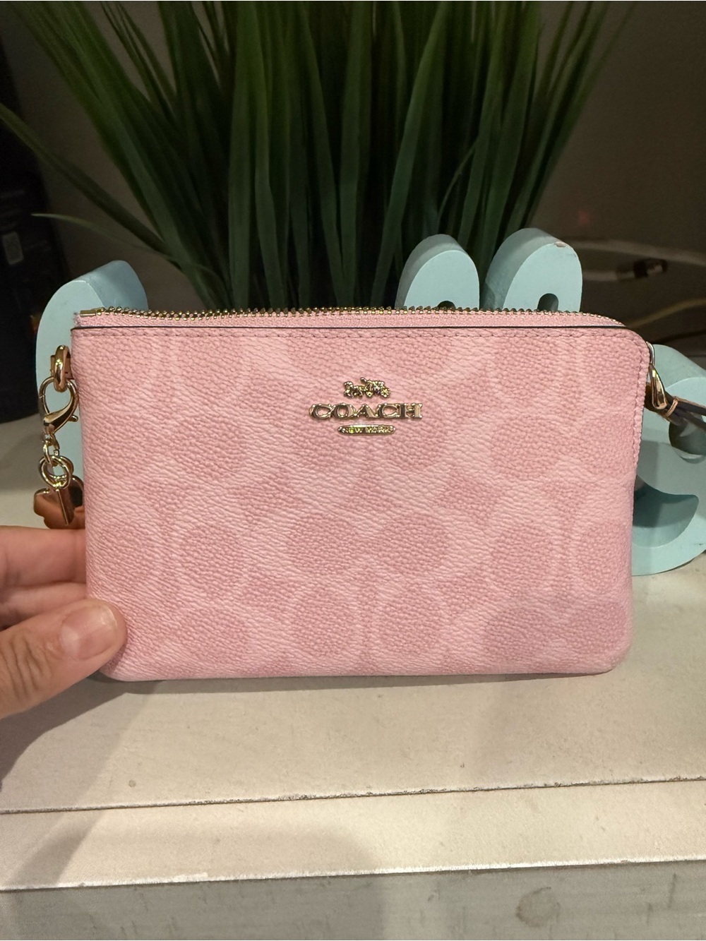 Coach Pink pink powder corner zip